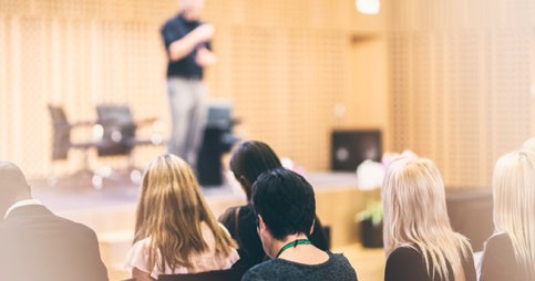 Speaker talking to audience