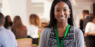 Woman with green lanyard